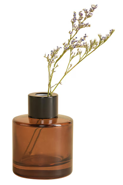 Perfume on driftwood